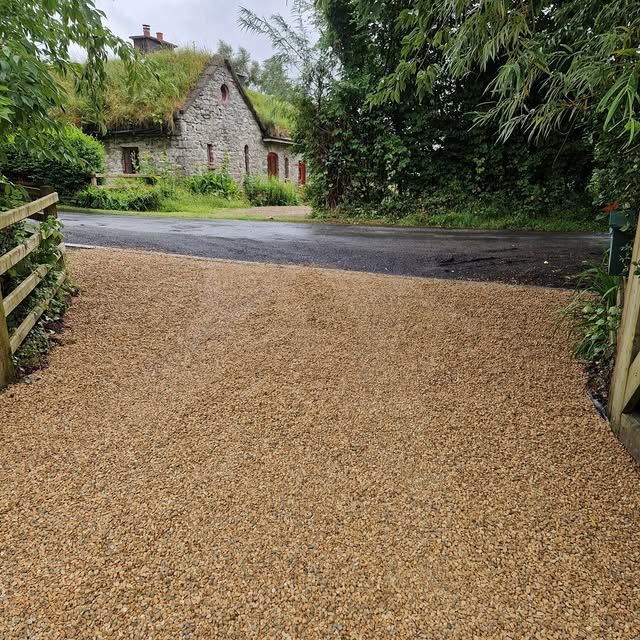 Completed gravel driveway and landscaped approach